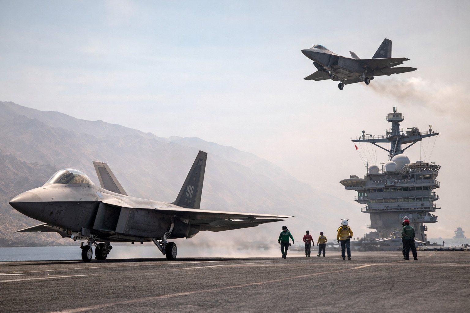 U.S. aircraft carrier with F-22 fighter jets deployed in the Middle East amid rising Iran strike market impact tensions