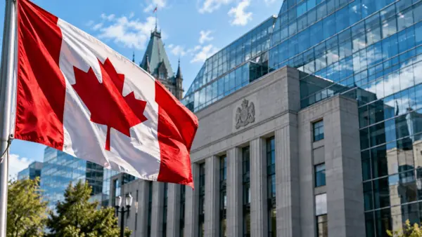 Close-up of the Bank of Canada building and the Canadian flag
