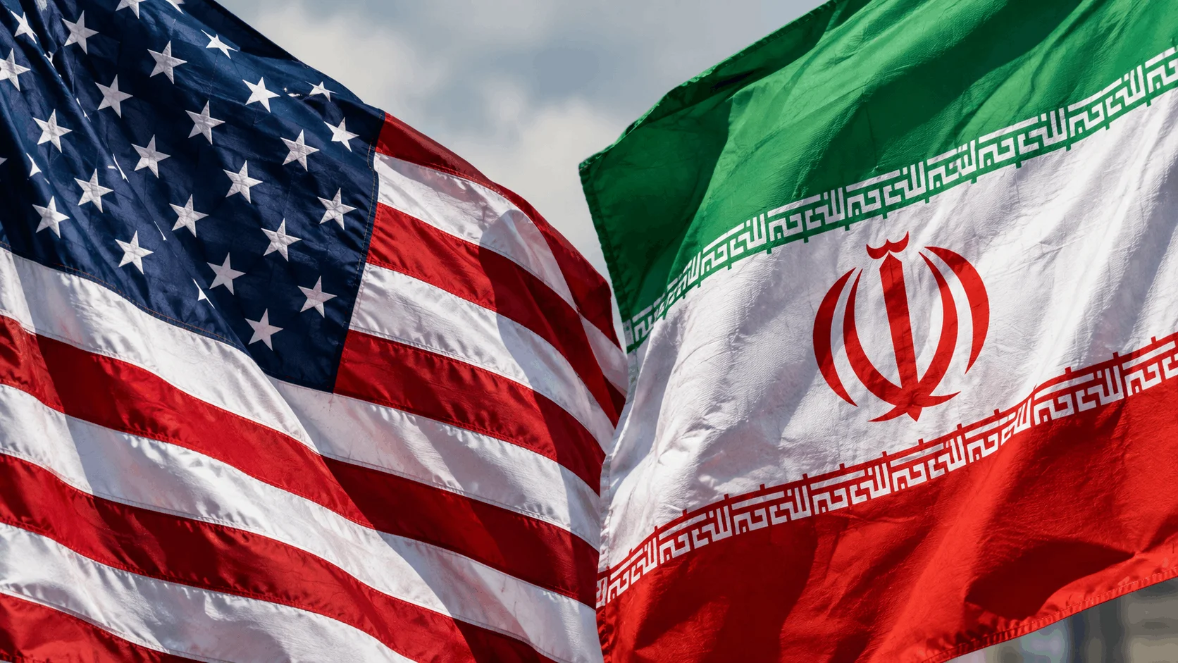 Close-up of the American and Iranian flags next to each other